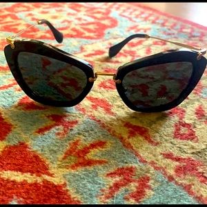 Brand new never worn Miu Miu cat eye sunglasses.